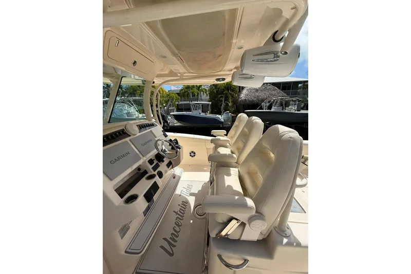 Slide: The Image of 2021 Grady-White Canyon 336 boat interior with helm and seating. - 24
