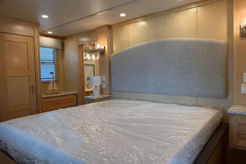 Slide: The Image of Luxurious bedroom interior in 2026 Sumerset Voyager houseboat, featuring modern design and cozy ambiance. - 17
