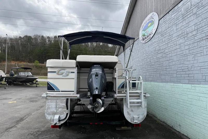 Slide: The Image of 2007 SunCatcher LX 22 SE pontoon boat with outboard motor, parked near Water Workz Marine. - 5