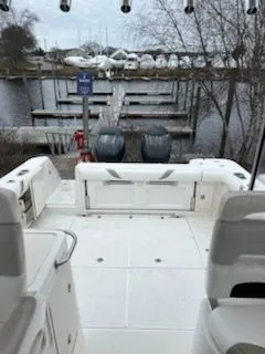 Slide: The Image of 2006 Boston Whaler 305 Conquest at dock with engines. - 16
