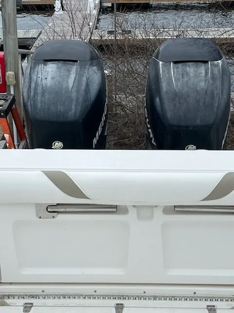 Slide: The Image of Two Mercury engines on a Boston Whaler 305 Conquest boat. - 17