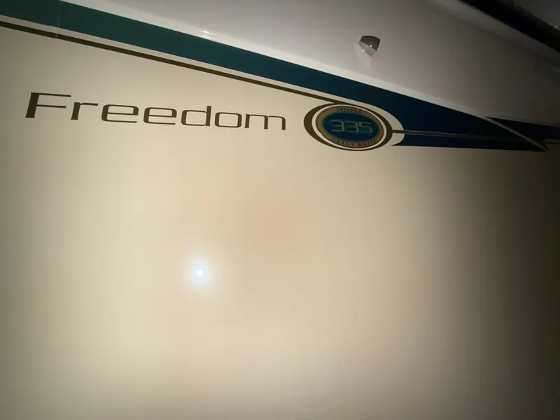 Slide: The Image of Grady-White Freedom 335 2013 - 5