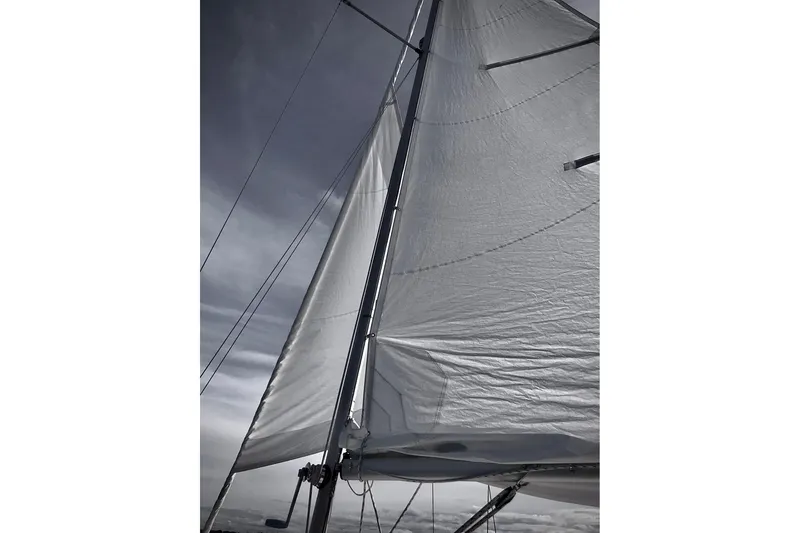 Slide: The Image of Sailing on a 1981 Cape Dory 25 under clear blue skies. - 6