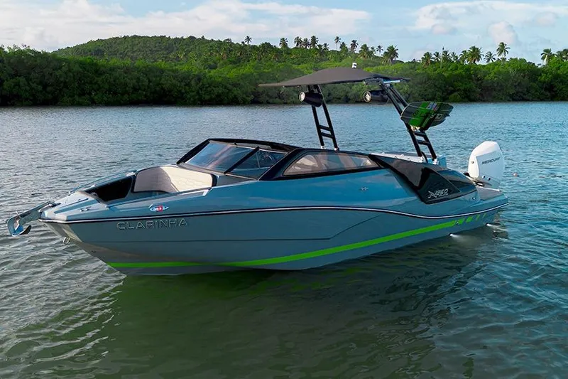 The Image of 2026 NX Boats NX260 on serene water, featuring sleek design and modern amenities. - 1