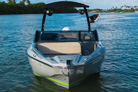 Slide: The Image of 2026 NX Boats NX260 on calm water, showcasing sleek design and modern features. - 4