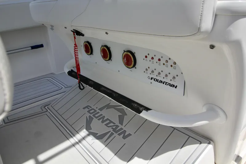 Slide: The Image of 2007 Fountain 34 Sportfish CC boat interior with open storage compartment. - 12
