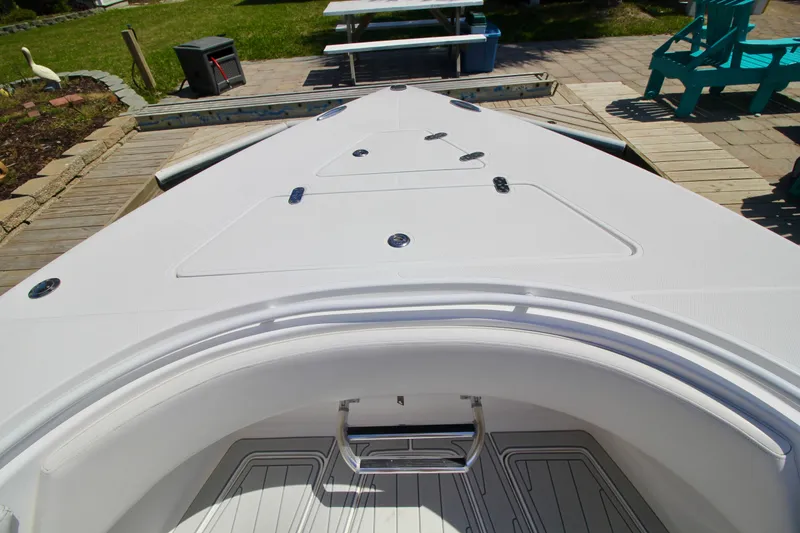 Slide: The Image of Fountain 34 Sportfish CC 2007 with Garmin equipment, palm trees in background. - 22