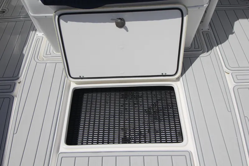 Slide: The Image of Open hatch on 2007 Fountain 34 Sportfish CC boat docked at marina. - 25