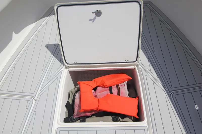 Slide: The Image of Open storage compartment on a 2007 Fountain 34 Sportfish CC boat. - 26
