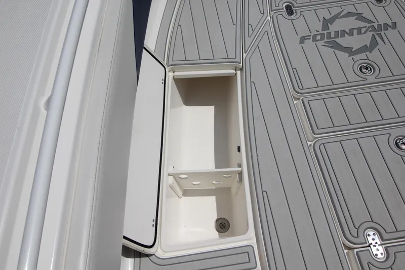 Slide: The Image of Storage compartment on 2007 Fountain 34 Sportfish CC with life jacket inside. - 28
