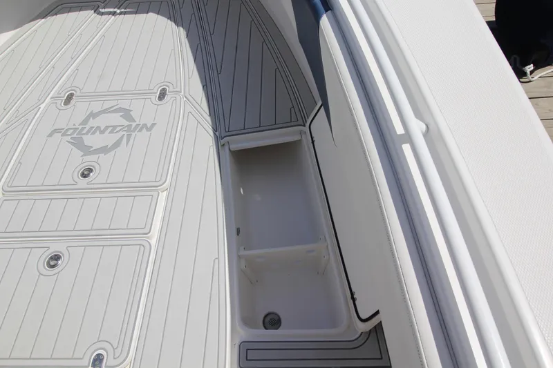 Slide: The Image of 2007 Fountain 34 Sportfish CC open storage compartment on deck. - 29