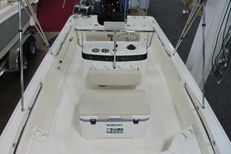 Slide: The Image of 2026 Boston Whaler 190 Montauk boat interior with seating and cooler. - 7