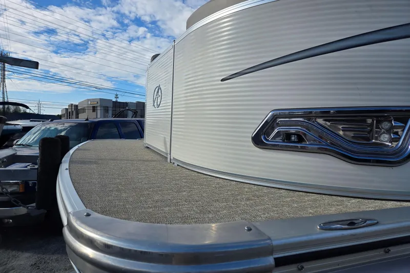 Slide: The Image of 2020 Avalon LSZ VRB 24' pontoon boat with sleek design and modern detailing. - 12