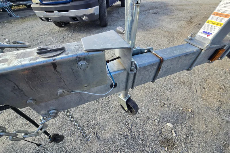 Slide: The Image of Trailer hitch of a 2020 Avalon LSZ VRB - 24' on gravel surface. - 13