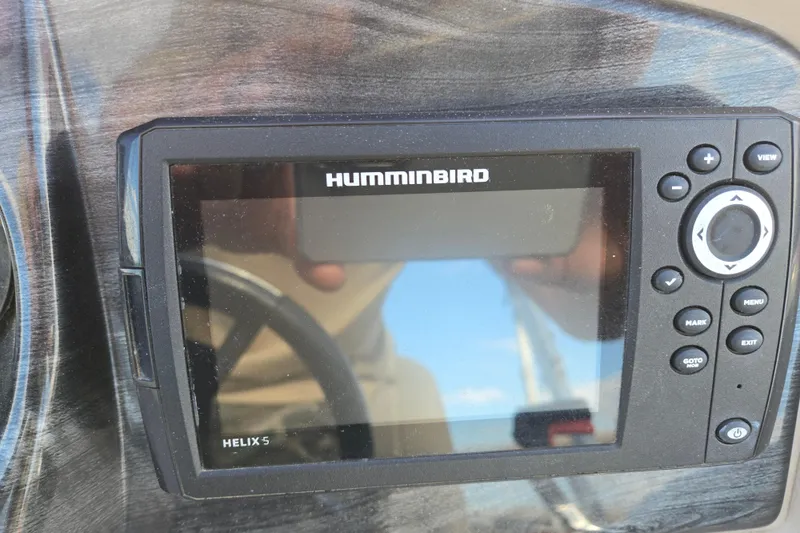 Slide: The Image of Humminbird Helix 5 fish finder on 2020 Avalon LSZ VRB - 24' boat dashboard. - 26