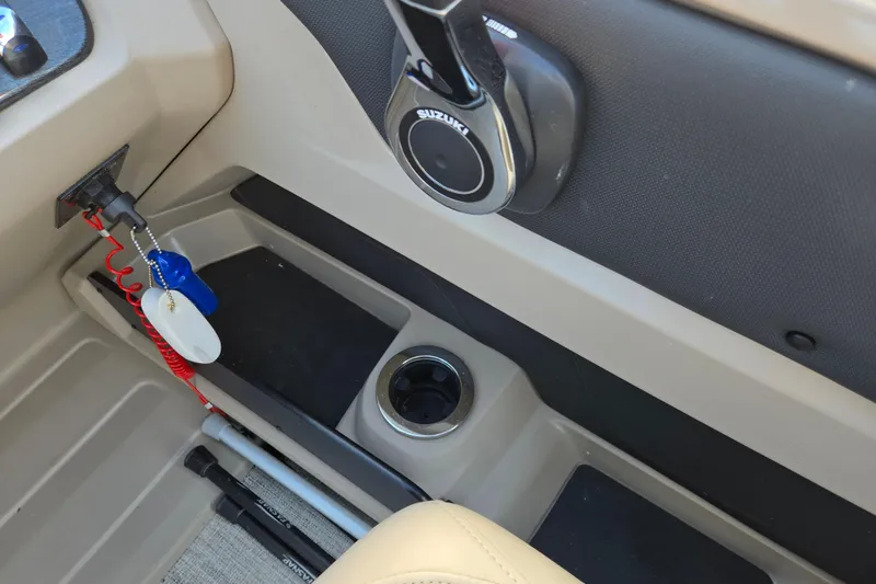 Slide: The Image of Interior of 2020 Avalon LSZ VRB boat with speaker, cup holder, and safety lanyard. - 28
