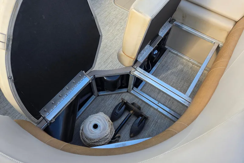 Slide: The Image of Storage compartment in 2020 Avalon LSZ VRB - 24' boat with rope and anchor. - 32