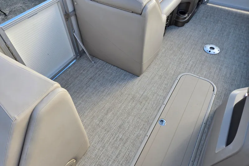 Slide: The Image of Interior of 2020 Avalon LSZ VRB 24' boat with beige seating and flooring. - 33
