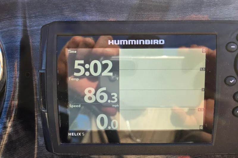 Slide: The Image of Humminbird Helix 5 display showing time, temperature, and speed on Avalon LSZ VRB - 24'. - 51