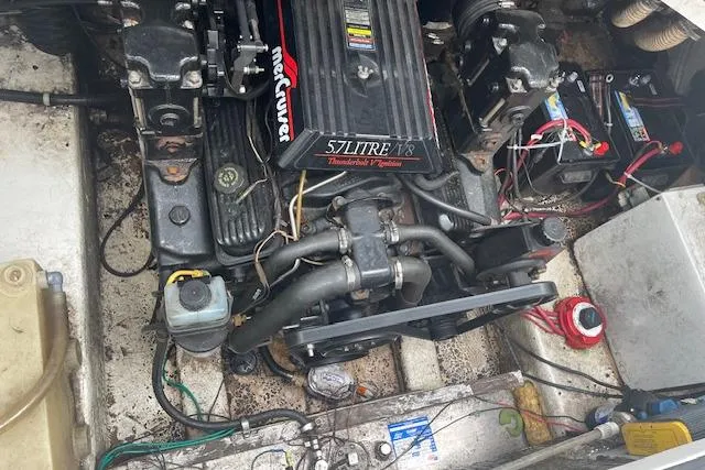 Slide: The Image of Engine compartment of a 1997 Bayliner 2355 boat with a 5.7L V8 MerCruiser engine. - 7