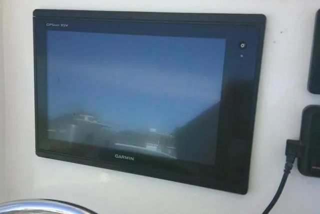 Slide: The Image of Garmin GPS screen on 2017 Sailfish 240 CC boat dashboard. - 31