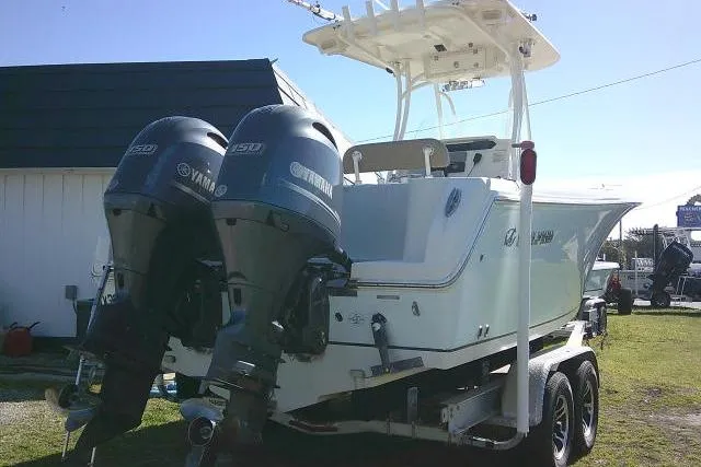 Slide: The Image of 2017 Sailfish 240 CC boat with twin Yamaha outboard engines on a trailer. - 5
