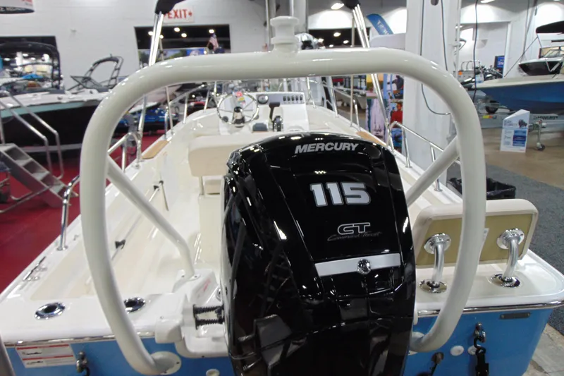 Slide: The Image of 2026 Boston Whaler 170 Montauk with Mercury 115 CT engine at a boat show. - 4