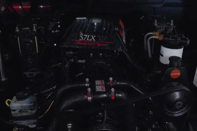 Slide: The Image of Engine compartment of a 1997 Sea Ray 280 Cuddy Cabin boat. - 10