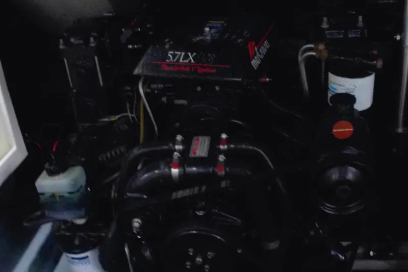 Slide: The Image of Engine compartment of a 1997 Sea Ray 280 Cuddy Cabin boat. - 9