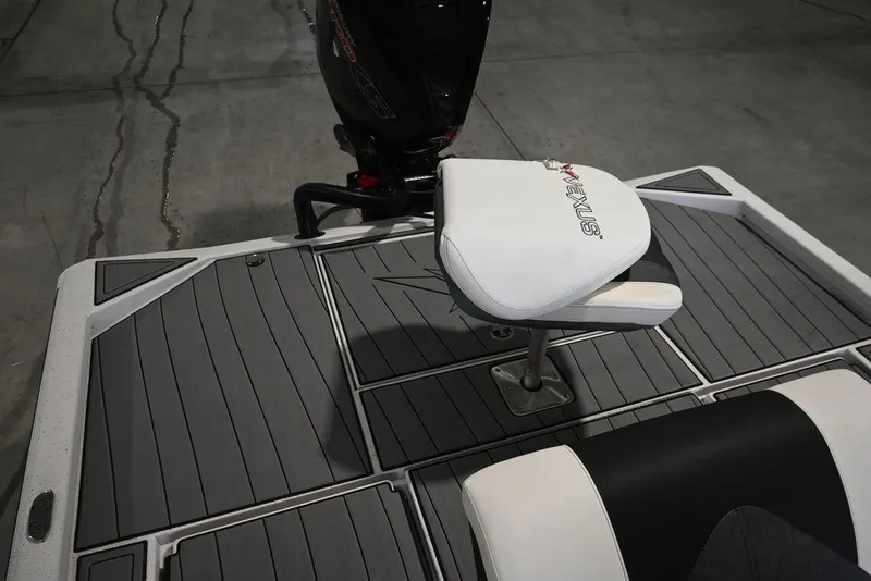 Slide: The Image of 2023 Vexus AVX2180CC boat deck with seating and motor, featuring sleek design. - 4