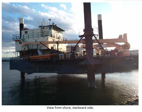 Slide: The Image of Custom 1981 lift boat, starboard view from shore, with cranes and lifeboat. - 7