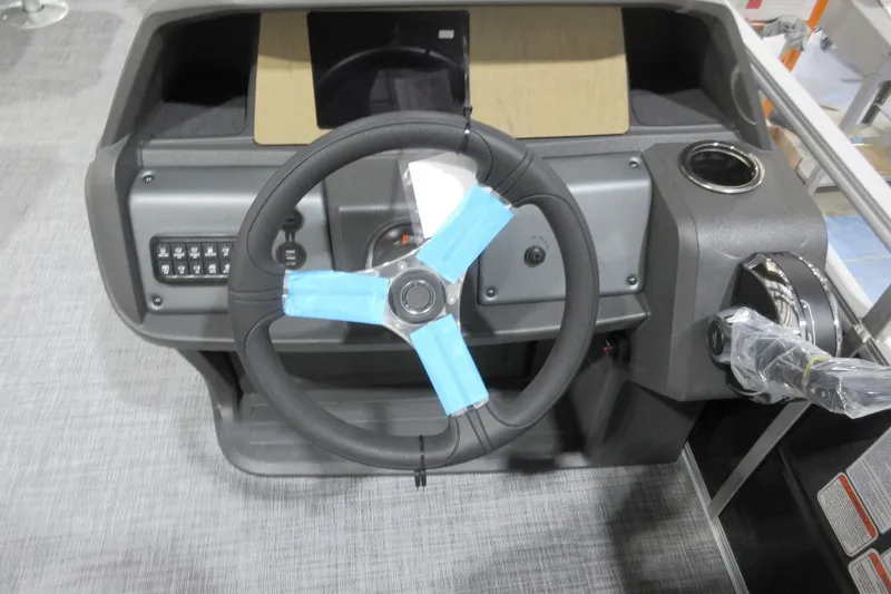 Slide: The Image of Steering console of 2026 Sun Tracker Fishin' Barge 20 DLX pontoon boat. - 4