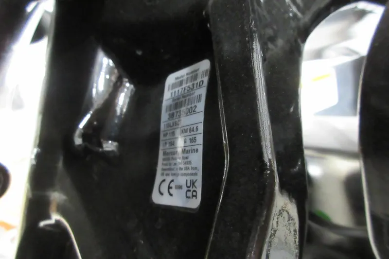 Slide: The Image of Close-up of a label on a 2026 Sun Tracker Fishin' Barge 20 DLX boat component. - 6