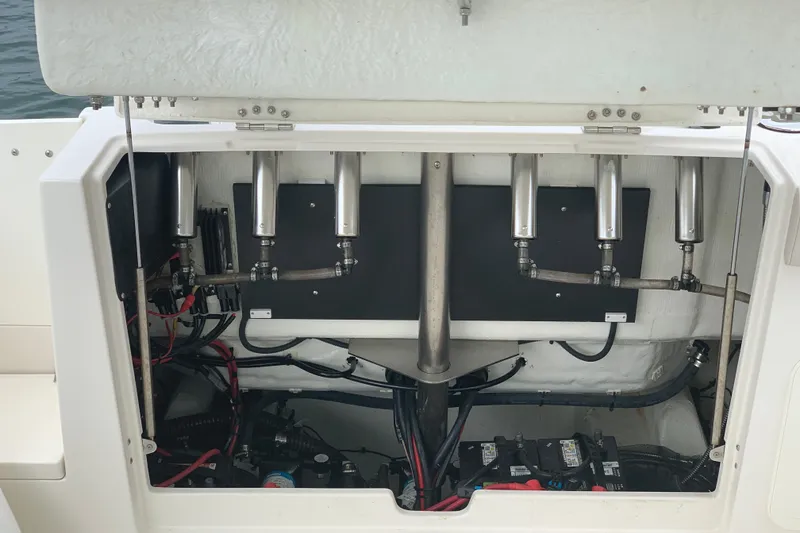 Slide: The Image of 2023 Sailfish 276 DC boat engine compartment with wiring and components visible. - 18