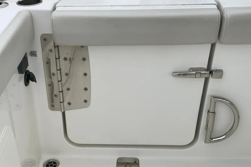 Slide: The Image of 2023 Sailfish 276 DC boat door with stainless steel hinge and handle. - 19