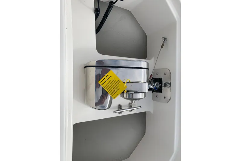 Slide: The Image of 2023 Sailfish 276 DC boat component with chrome finish and safety label. - 33