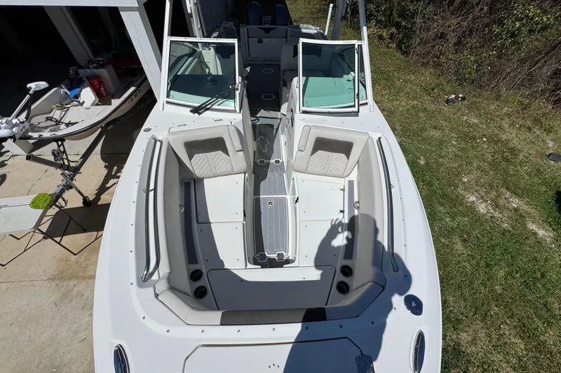 Slide: The Image of 2022 Sailfish 276 DC boat, aerial view, showcasing spacious seating and sleek design. - 17