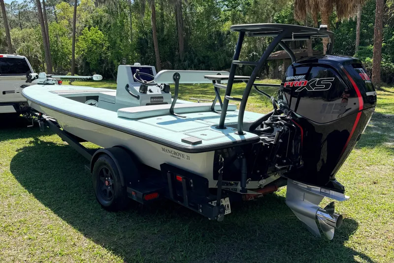 The Image of 2022 Chittum Skiffs Islamorada 21 boat with Mercury Pro XS engine on trailer. - 0