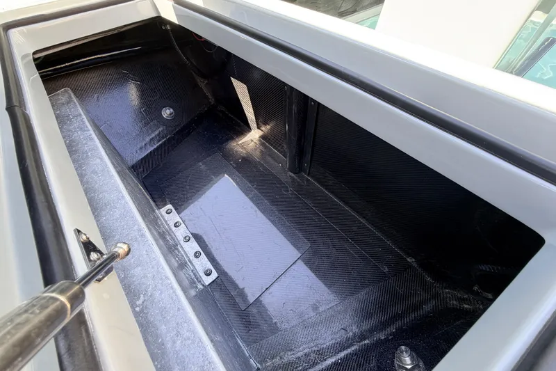 Slide: The Image of Storage compartment of 2022 Chittum Skiffs Islamorada 21, showcasing sleek interior design. - 18