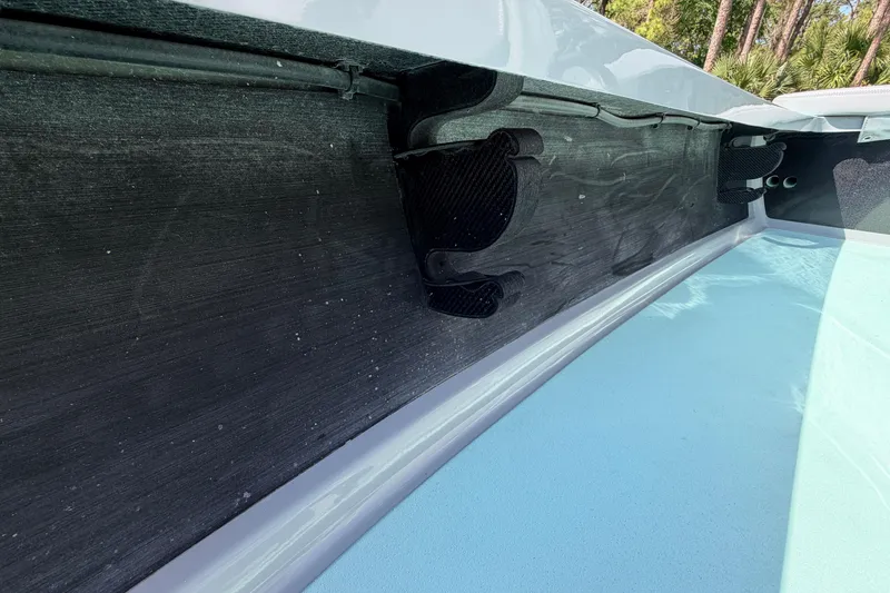 Slide: The Image of Interior view of a 2022 Chittum Skiffs Islamorada 21 boat, showcasing sleek design details. - 21