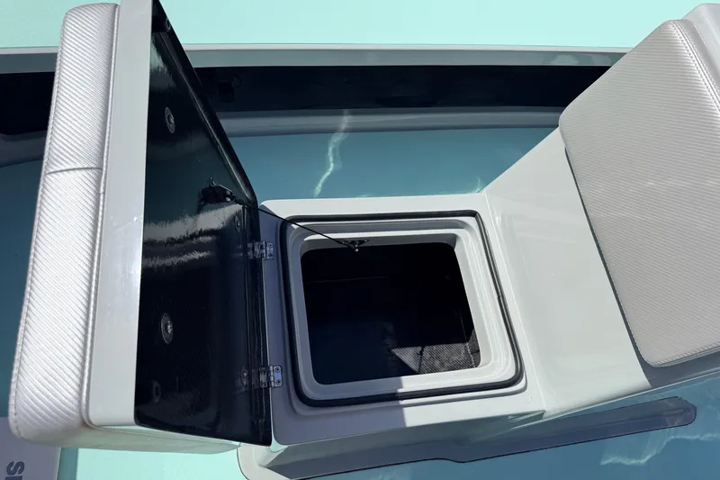 Slide: The Image of Open storage compartment on 2022 Chittum Skiffs Islamorada 21 boat. - 29