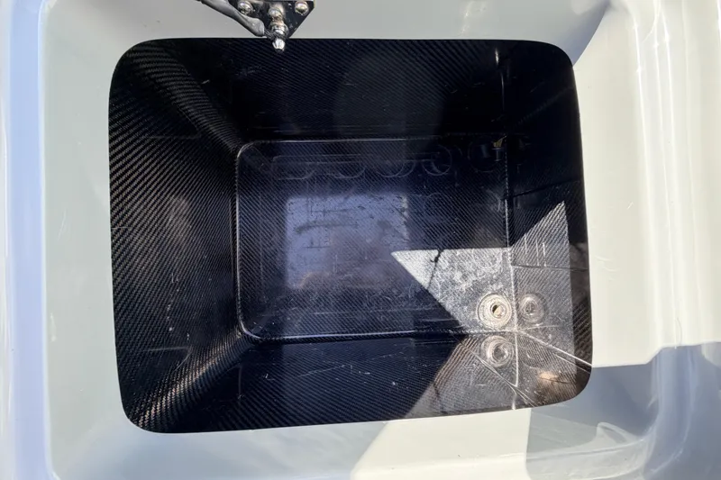 Slide: The Image of Carbon fiber compartment in 2022 Chittum Skiffs Islamorada 21 boat. - 30