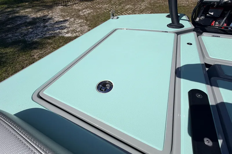 Slide: The Image of 2022 Chittum Skiffs Islamorada 21 deck, featuring sleek design and mint green finish. - 38