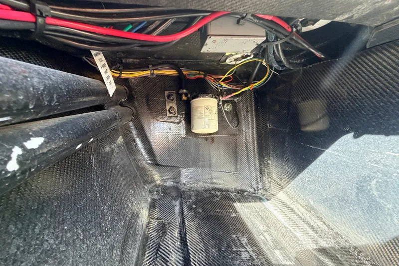 Slide: The Image of Interior wiring and components of a 2022 Chittum Skiffs Islamorada 21 boat. - 41