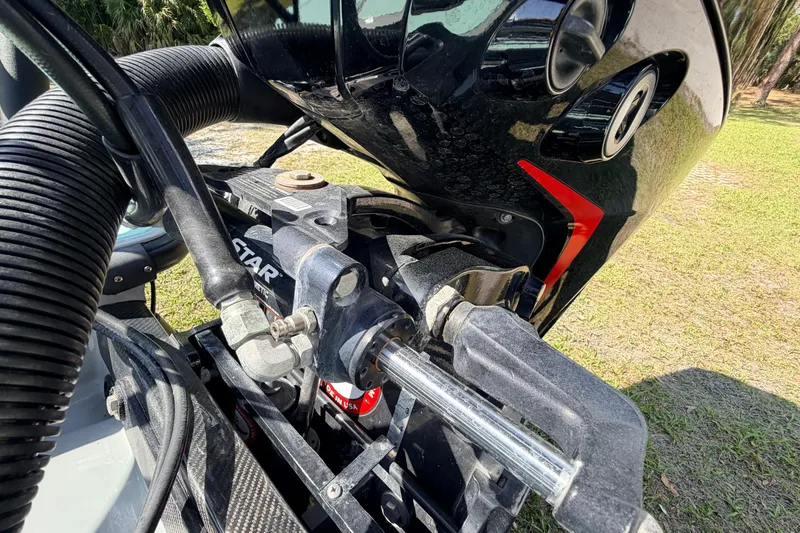 Slide: The Image of Close-up of 2022 Chittum Skiffs Islamorada 21 boat engine components. - 59