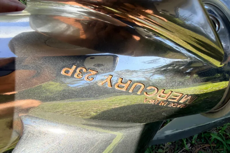 Slide: The Image of Close-up of a Mercury 23P propeller on a 2022 Chittum Skiffs Islamorada 21 boat. - 66