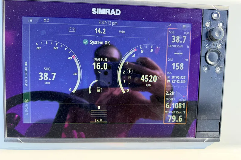 Slide: The Image of Simrad display on 2022 Chittum Skiffs Islamorada 21 showing speed, fuel, and navigation data. - 85