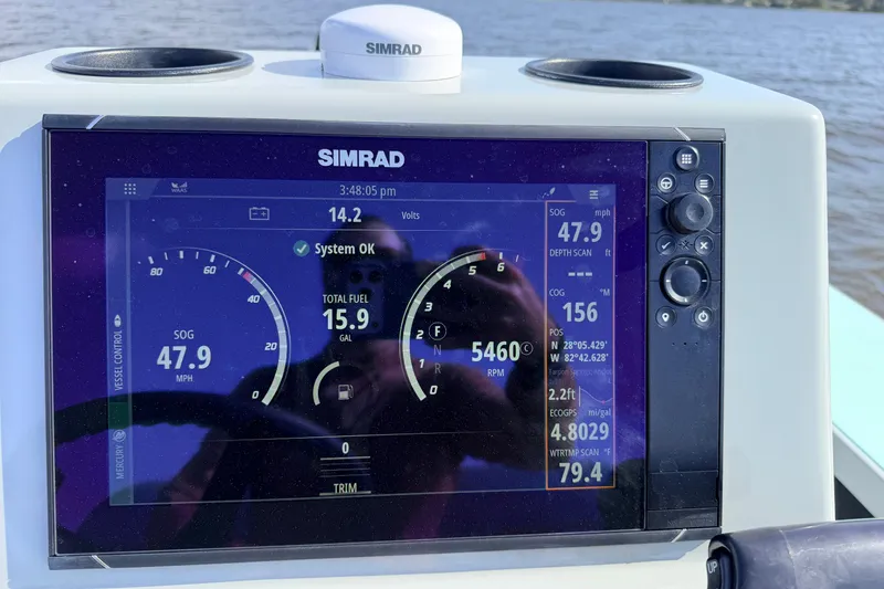 Slide: The Image of Simrad display on 2022 Chittum Skiffs Islamorada 21, showing speed and fuel data. - 87