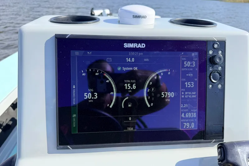 Slide: The Image of Simrad display on 2022 Chittum Skiffs Islamorada 21, showing speed and navigation data. - 88