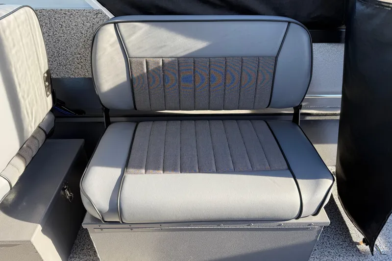 Slide: The Image of 2026 Alumaweld Stryker 202 boat seat with gray upholstery and storage compartment. - 22